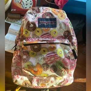 Jansport doughnut backpack. Everything works as it should.